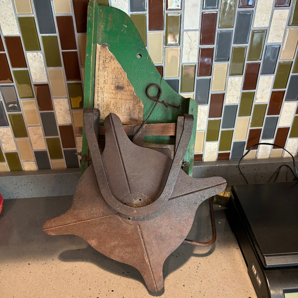 Antique seed spreader with hand crank